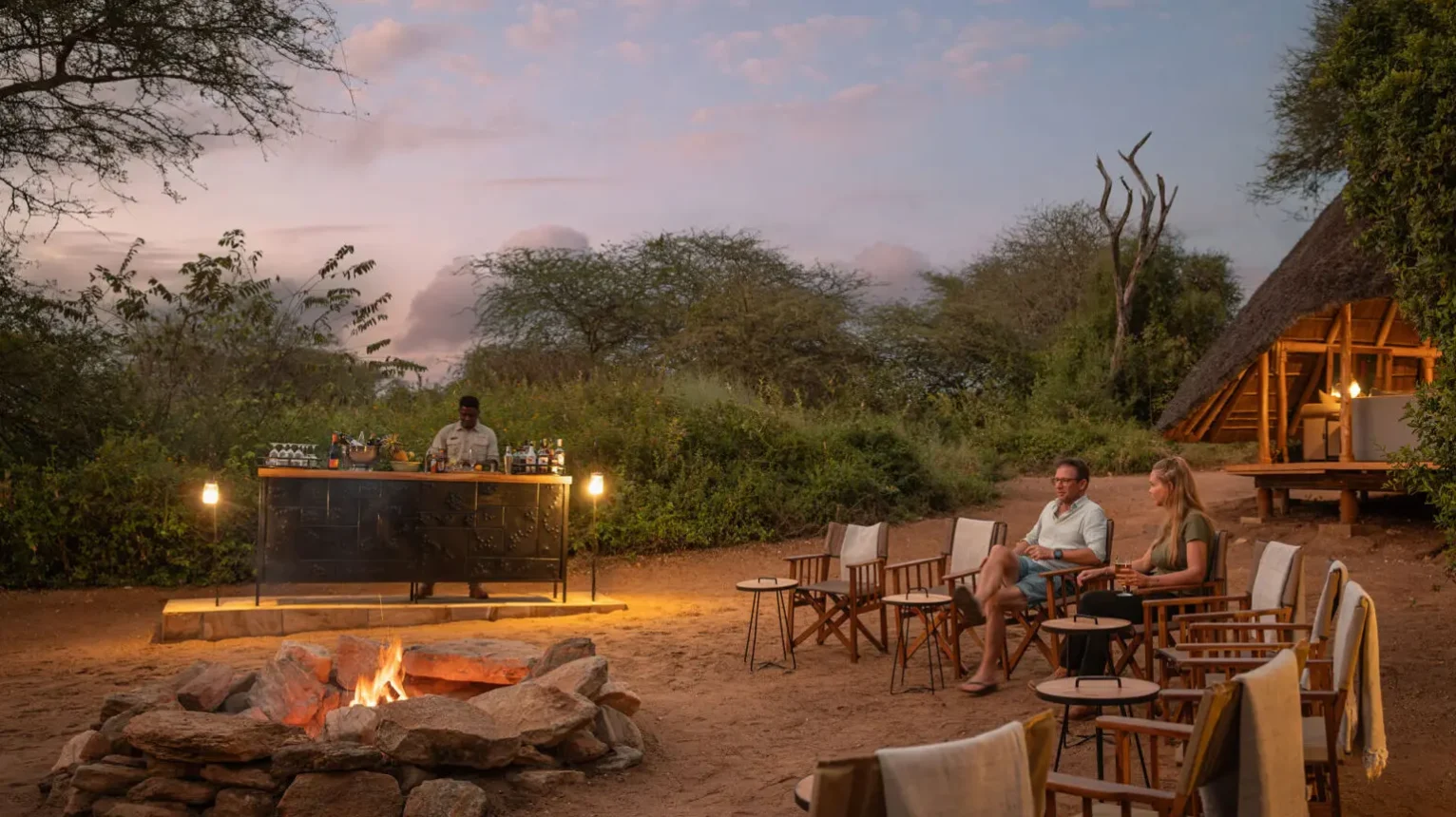 Guests-enjoying-a-sundowner-in-Tanzania