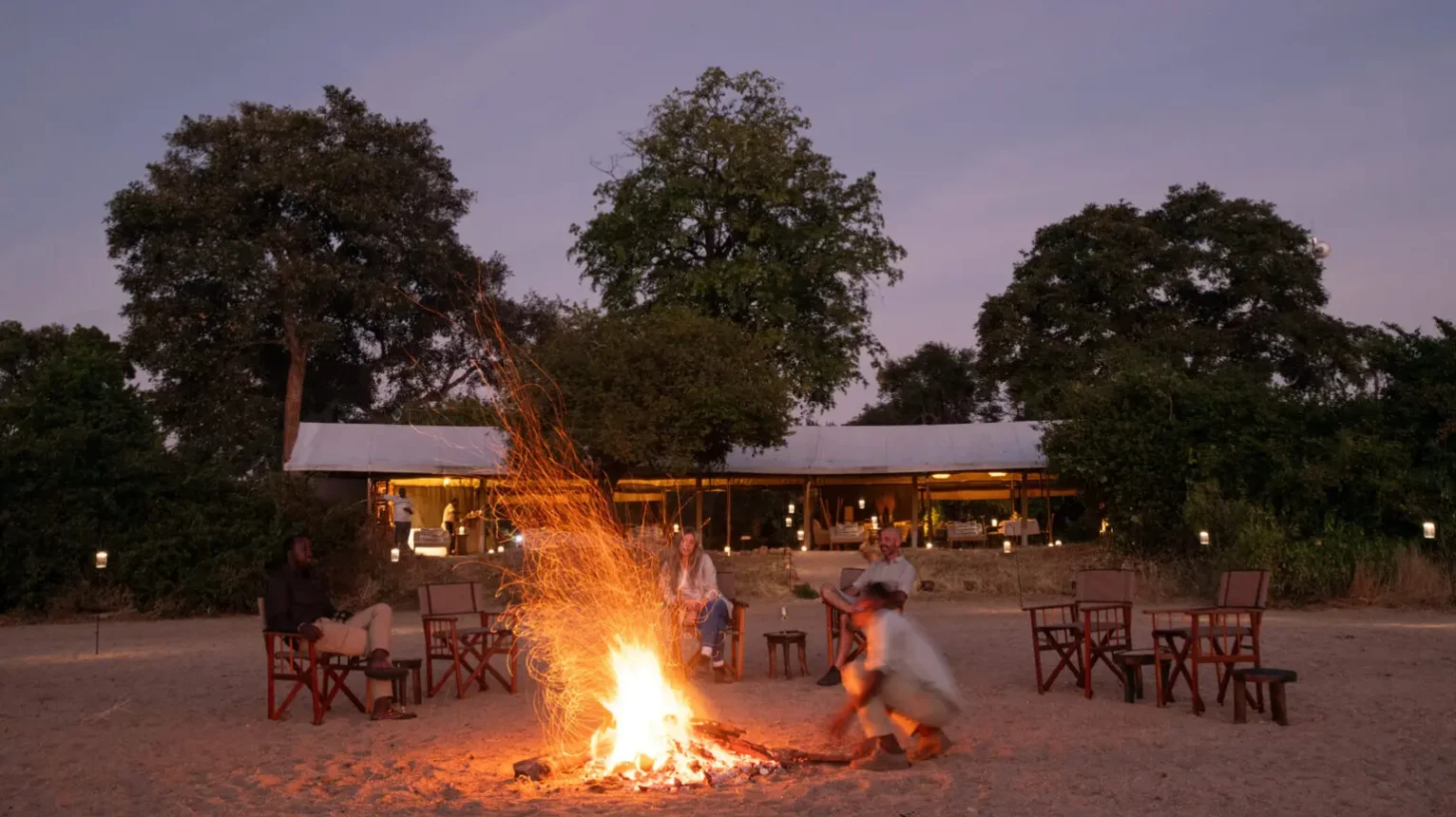 asilia-guests-camp-fire-kokoko-camp